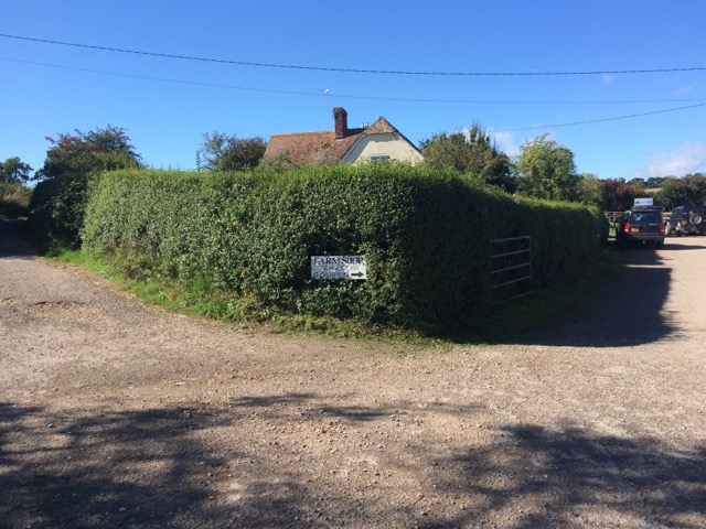 Fence sign for Home Farm store